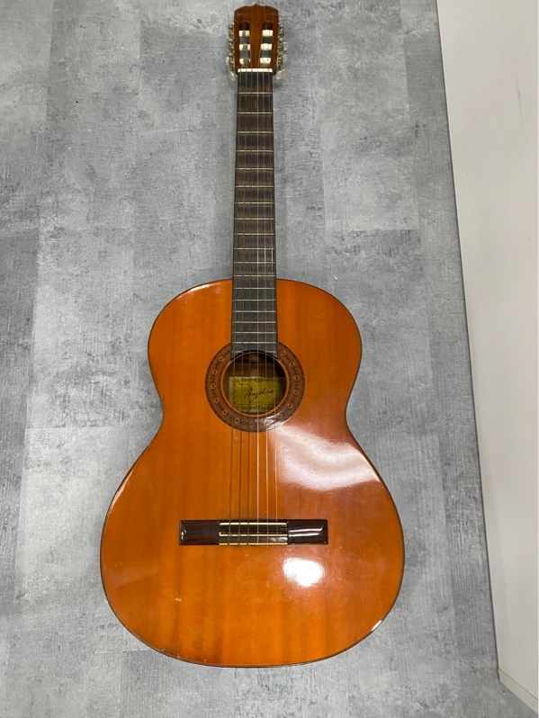 Đàn Guitar Acoustic cổ điển nhãn hiệu Angélica - Model A-585 - Màu nâu - Ngoại hình: 97% - Cấn trầy nức, xước thùng - Kèm túi