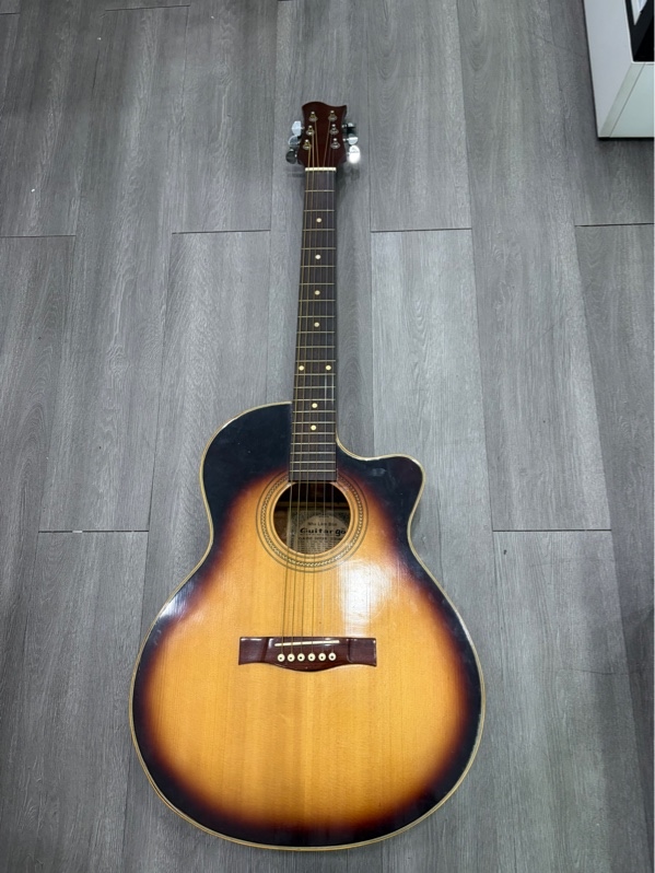 Đàn Guitar Acoustic no name - Màu nâu - Ngoại hình 97% - Cần đàn cấn nhẹ, nổ sơn,thùng đàn trầy xước - Kèm túi rách