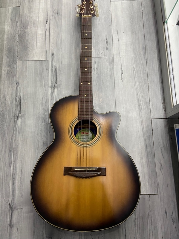 Đàn Guitar Acoustic No Name - Màu nâu - Ngoại hình: 97% - Trầy xước nhiều, cấn - Kèm túi