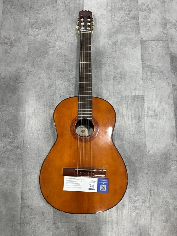 Đàn Guitar bình tập chơi - Màu vàng sậm - Ngoại hình 97% - Body
