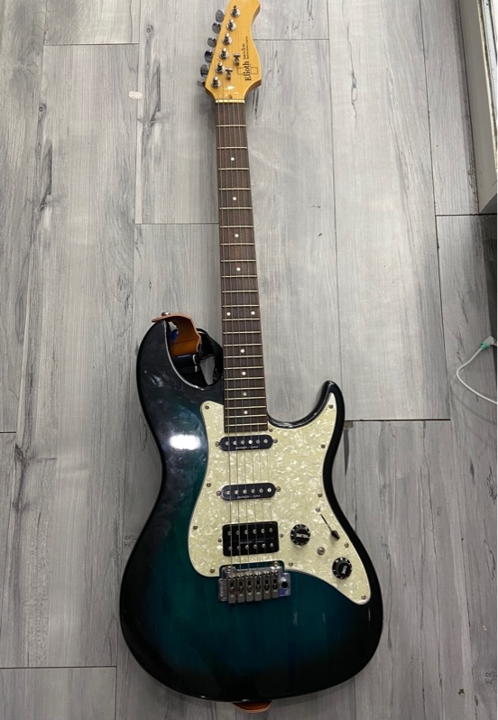Đàn Guitar Điện Elioth S305 - Màu xanh - Ngoại hình: 97.5% - Xước thân nhẹ - Kèm dây cắm