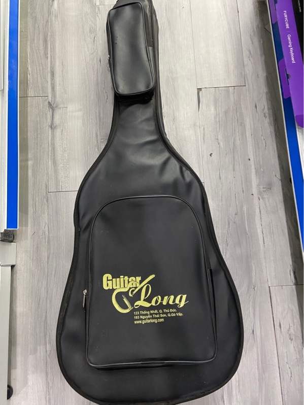 Đàn Guitar NoName - Màu nâu - Ngoại hình: 97% - Tróc Sơn, bên trong đàn dính sơn trắng - Kèm túi