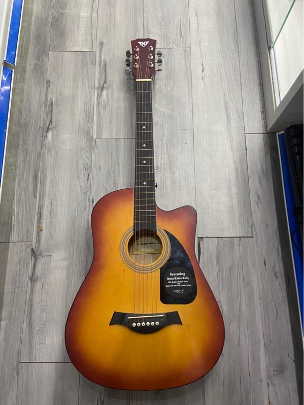 Đàn Guitar TNT - Màu nâu - Ngoại hình: 98% - Kèm dây đàn