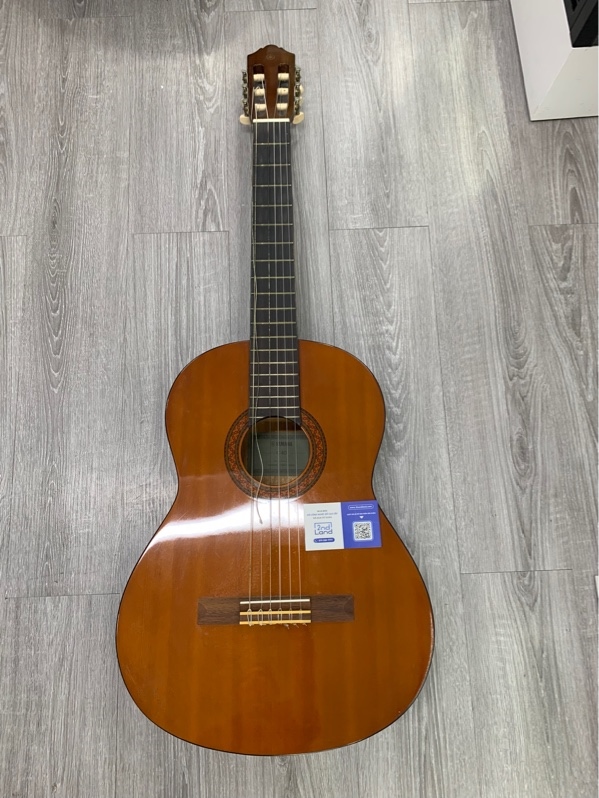 Đàn guitar yamaha c40 - Màu gỗ - Ngoại hình: 97% - Đứt 1 dây - Kèm túi