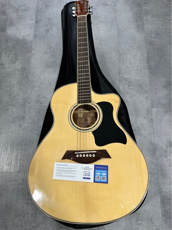 Đàn tập chơi Guumusic.com - Màu vàng gỗ - Ngoại hình 97% - Dây rỉ sắt theo thời gian - Kèm túi