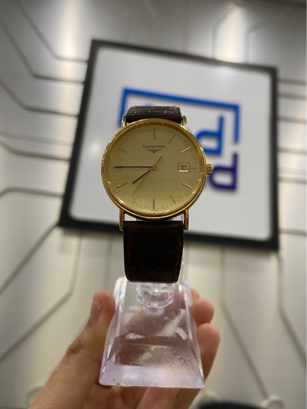 Đồng hồ Longines L4.720.2 - 33mm - Màu vàng - Ngoại hình: 97% -nắp pin trầy, dây cũ - Body