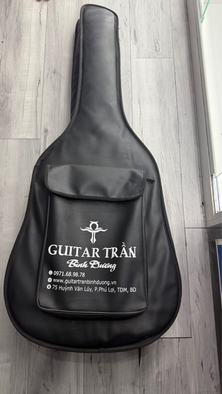 Guitar Aucostic Hàng Gia Công Trần Bình Dương - Màu nâu - Ngoại hình: 97% - Xước thân, mất dây đàn số 3 - Kèm túi