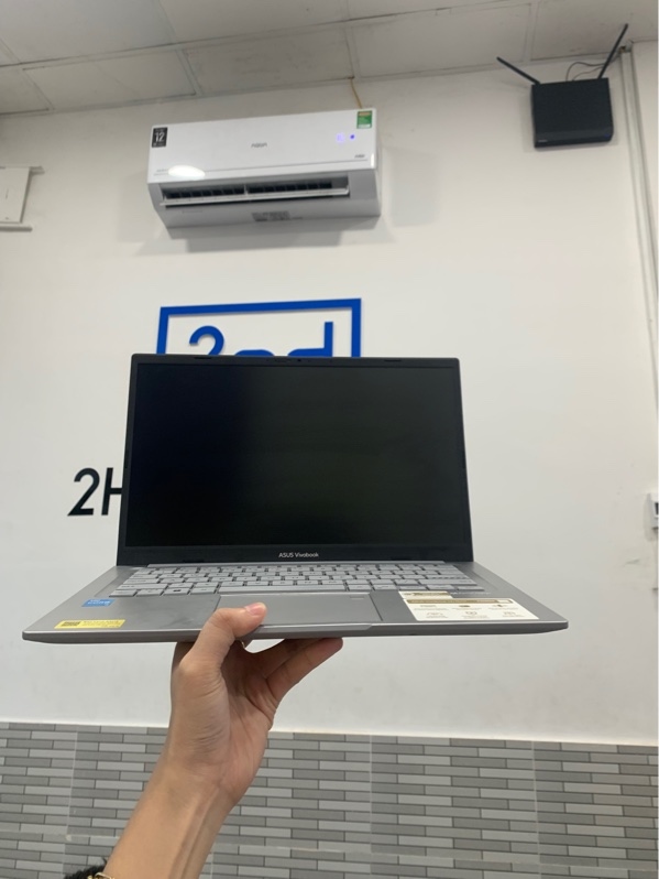 Laptop ASUS Vivobook 14 X1404VA - Intel Core i3-1315U - RAM 8GB/SSD 512GB - Màu trắng - Pin 89% - Ngoại hình: 97% - Có sticker, màn hình ám hồng - Kèm sạc