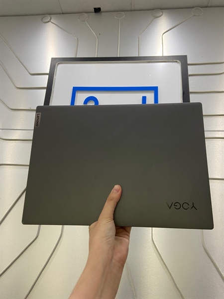 Laptop Lenovo Yoga Slim 7 - Ryzen 5 5600U - Ram 8/256GB SSD - Pin 94% - Màu đen - Ngoại hình: 97% - ám viền vàng vừa - Kèm sạc