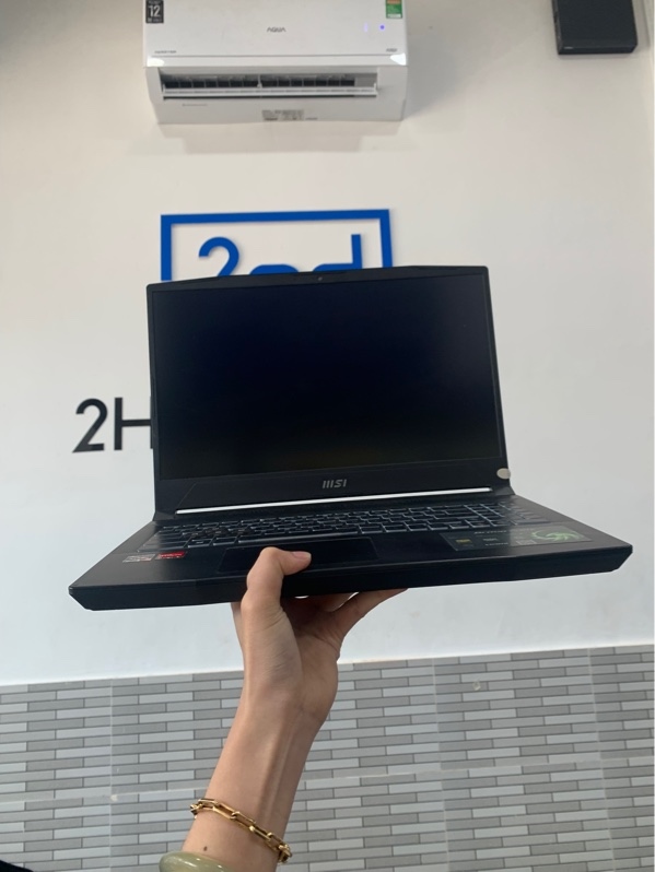 Laptop MSI bravo 15 B7ED - Ryzen 5 7535HS - Ram 16GB/512GB SSD - AMD radeon rx 6550m - Màu đen - Pin 84% - Ngoại hình: 97% - 1 đóm phản quang, hở mặt b - Fullbox