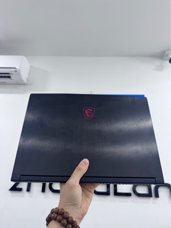 Laptop Msi GF63 Thin 12UC - i5-12450H - 16/512Gb SSD - card RTX3050 - Màu đen - Pin 86 - Ngoại hình 97% - Sức khỏe ổ 93, body trầy xước, mất 2 ốc đáy, 1 góc cấn nặng, kính màn trầy, màn ám vàng, hở sáng nhẹ - Kèm sạc