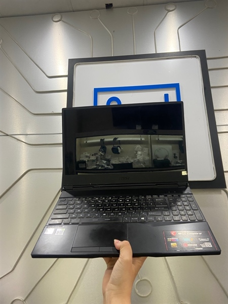 Laptop MSI GL65 Leopard 10SDK - i7-10750H - GTX 1660 Ti - Ram 16/1TB - Pin 75% - Màu đen - Ngoại hình: 97% - Mất 1 ốc mặt D, màn chớp, ám hồng nặng, in phím - Kèm sạc không bảo hành 1