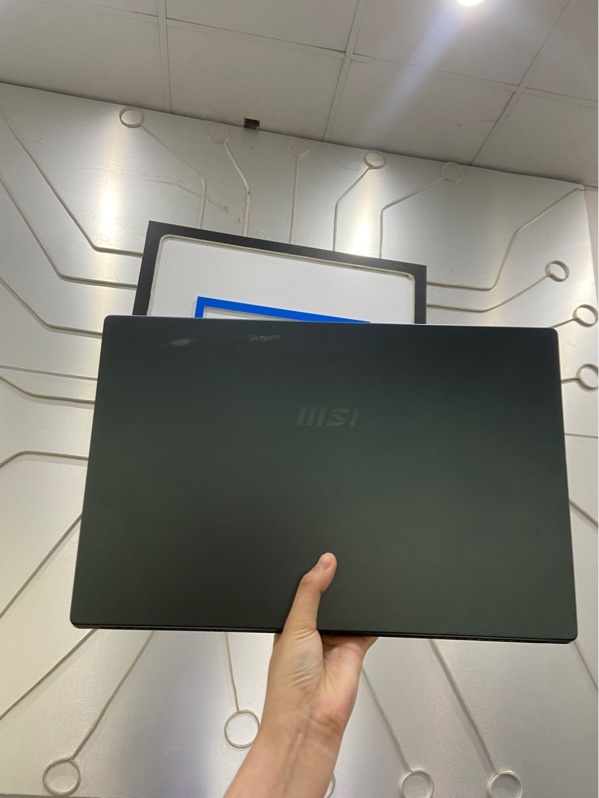 Laptop MSI modern 15 A11MU - Intel core i5-1155G7 - Ram 8-512GB - Pin 65% - Màu xám - Ngoại hình: 97% - Màn phản quang, in phím , ám xanh màn , dính bụi, xước thân, loa rè - Kèm sạc