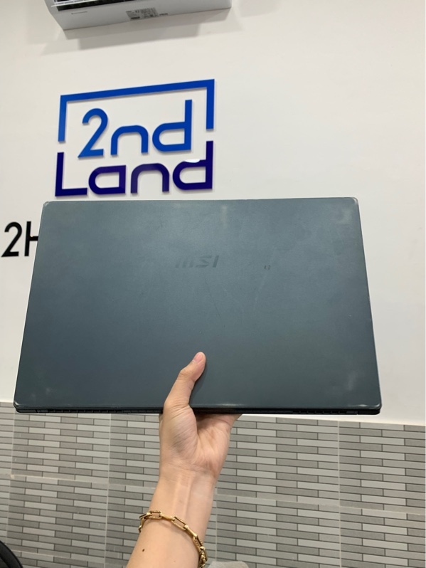 Laptop MSI Modern 15 A5M - Ryzen 5 5700U - Ram 8GB/512GB SSD - Màu xanh - Pin 60% - Ngoại hình: 97% - Màn in phím, phản quang, tróc touchpad - Kèm sạc
