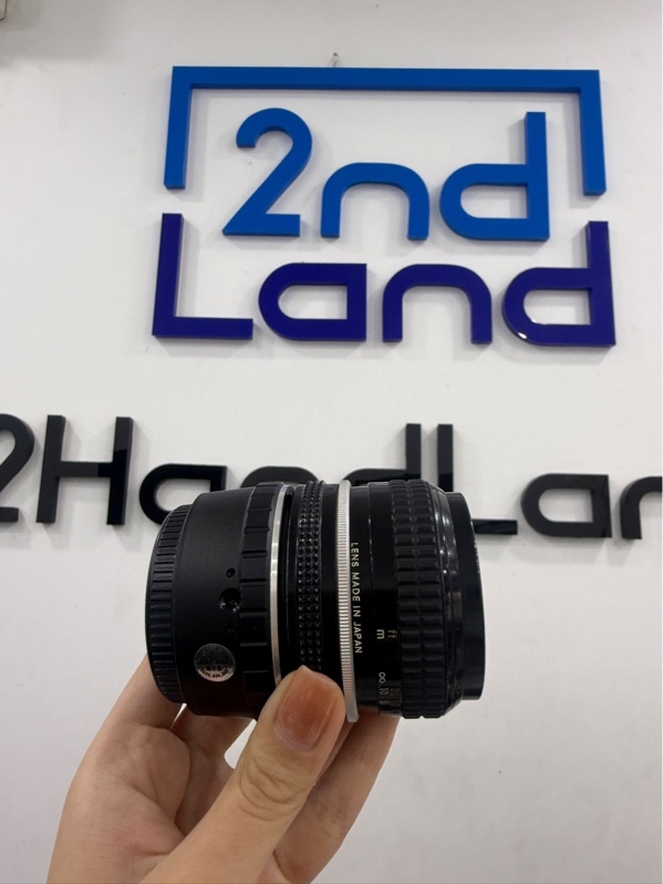 Lens NIKON NIKKOR 50mm f1:2 - Màu đen - Ngoại hình 96% - trầy ngàm kết nối , bụi trong , rễ tre, mốc - Body