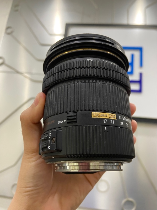 Lens Sigma 17-50mm f/2.8 EX DC OS HSM Cho Canon - Màu đen - Ngoại hình: 97% - Xước kính - Body