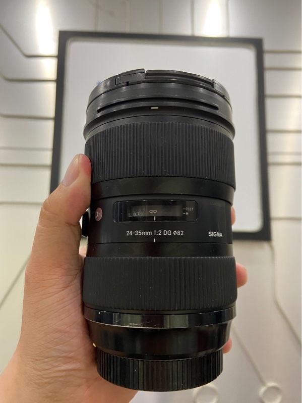 Lens Sigma 24-35mm F/2 DG HSM For Canon - Ngàm F, EF - Màu đen - Ngoại hình: 97% - Bụi trong, trầy cấn, xước thân, nhựa chảy - Body