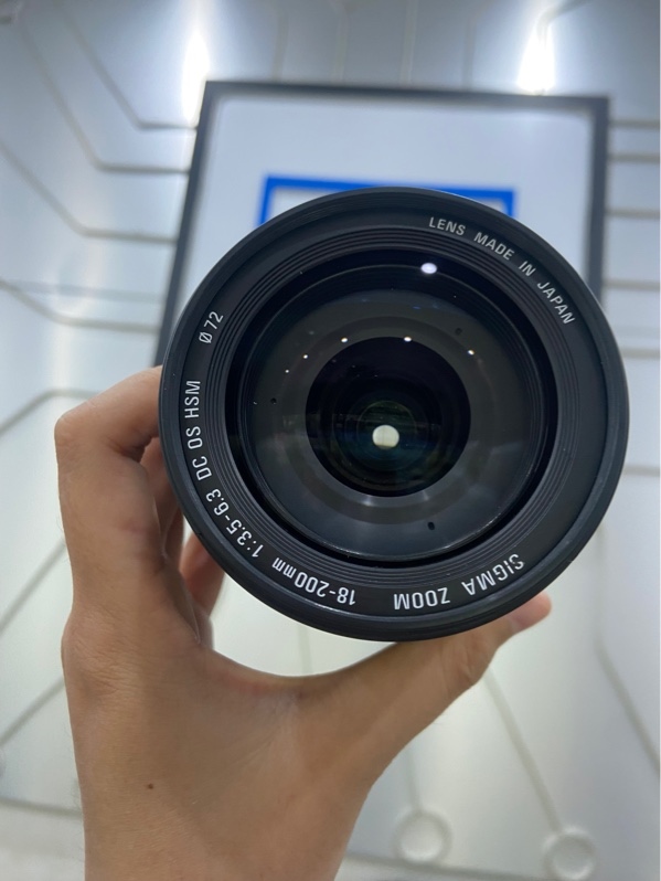 Lens Sigma DC - 18-200mm 1:3.5-6.5 HSM Macro 0.45/1.48ft for canon - Màu đen - Ngoại hình: 98% - Body