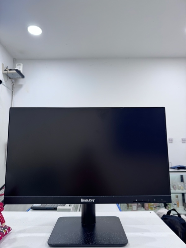 Màn hình Huntkey N2221 - FullHD - 100hz - Màu đen - Ngoại hình 97% - Dính sơn nhiều trên màn và đế, màn ám hồng, tối nhẹ hai góc, màn chết pixel, có một đốm đen bên trái - Kèm nguồn, dây HDMI