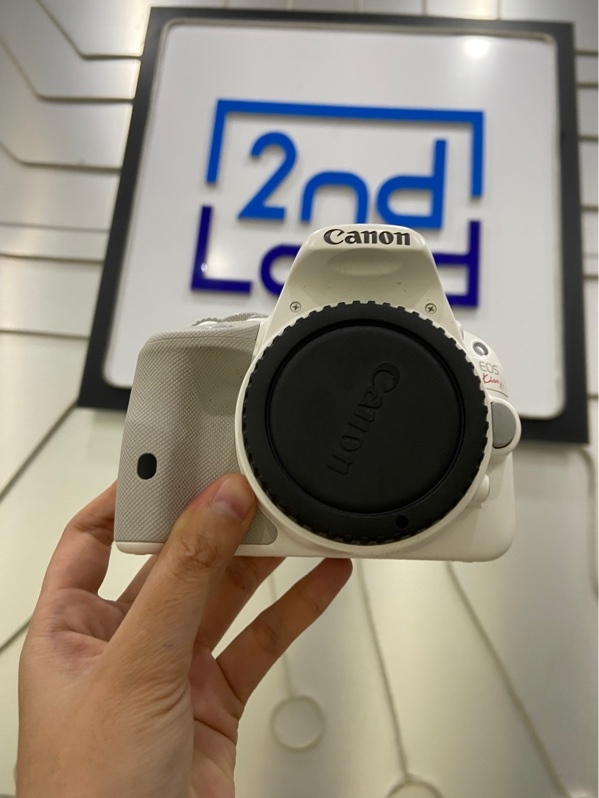 Máy ảnh Canon EOS Kiss X7 - Màu trắng - Ngoại hình: 97% - Hơn 20 điểm dead pixel sensor, màn liveview ám vàng - Kèm túi + 1 pin + 1 sạc