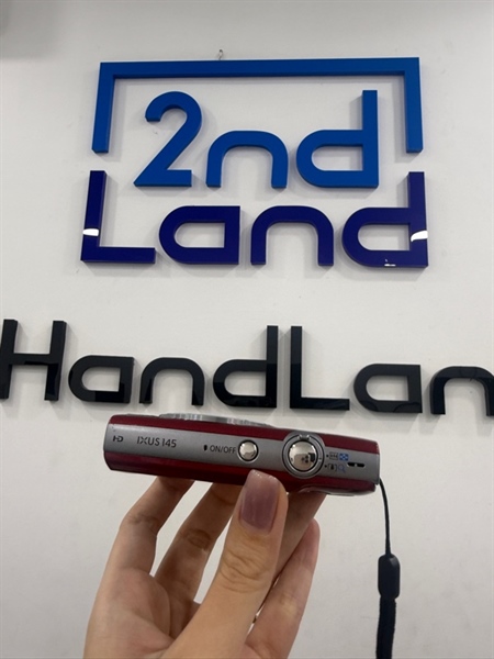 Máy ảnh Canon Ixus 145 (PC2048) - Màu đỏ - Ngoại hình 97% - Trầy xước , mất nắp che cổng - Kèm sạc linh kiện , 1 pin 2