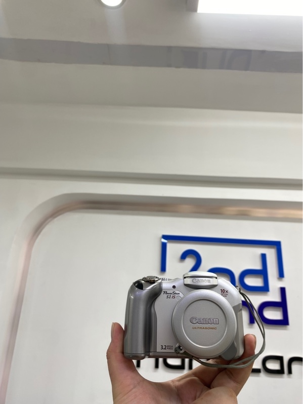 Máy ảnh Canon Powershot S1-IS - Màu bạc - Ngoại hình 97% - móp hở đèn flash - Kèm Box, 4 pin, dock sạc, đầu đọc thẻ nhớ, cáp kết nối, 1 thẻ nhớ, 3 đĩa