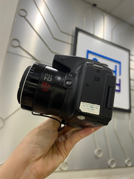 Máy ảnh Canon SX50HS - Màu đen - Ngoại hình: 97% - Màn tối viền, trầy ống ngắm, nhiều đốm đen, mất nắp cổng kết nối, mất đệm báng tay cầm - Kèm 1 pin + dock sạc 1