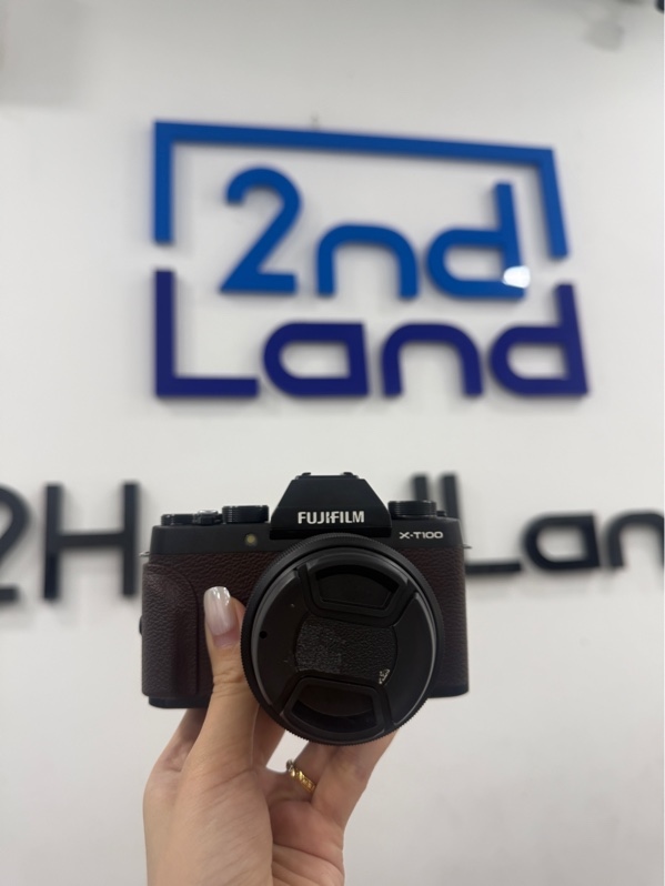 Máy ảnh Fujifilm X-T100 - Màu nâu - Ngoại hình 98% - trầy 2 vết chổ đeo dây - Kèm Box , 1 pin , 1 sạc linh kiện , lens Fujinon super EBC XC 15-45mm f3.5-5.6 OIS
