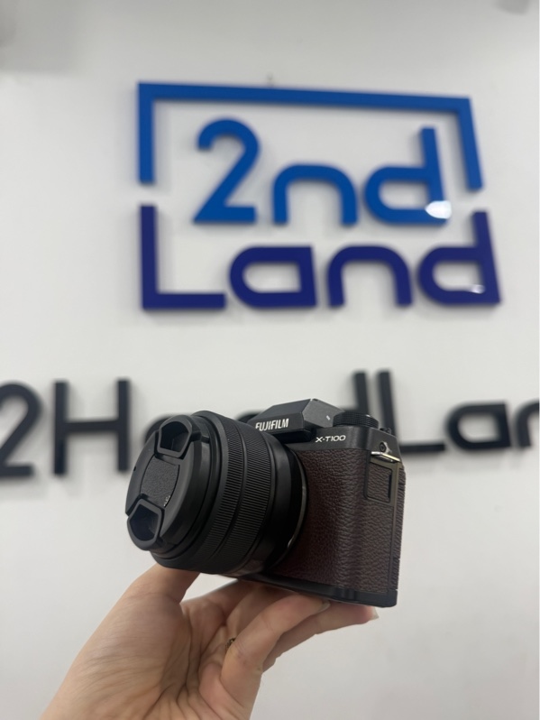 Máy ảnh Fujifilm X-T100 - Màu nâu - Ngoại hình 98% - trầy 2 vết chổ đeo dây - Kèm Box , 1 pin , 1 sạc linh kiện , lens Fujinon super EBC XC 15-45mm f3.5-5.6 OIS
