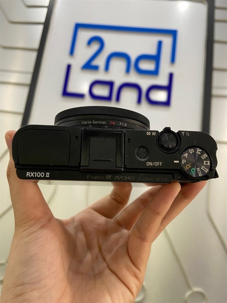 Máy ảnh Sony Cyber Shot DSC - RX100 II - Màu đen - Ngoại hình: 97% - Body - Kèm 1 pin + sạc + 1 thẻ 4GB + Lens 1.8-4.9/10.4-37.1 , Lens bị rễ 1