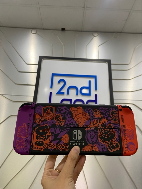 Máy chơi game cầm tay Nintendo Switch OLED - Màu đen - Ngoại hình: 97% - Hơi xước - Kèm sạc, dock, túi vải, cặp dây đeo joy-con màu trắng