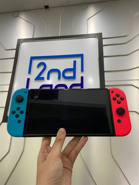 Máy chơi game Nintendo Oled - Màu đen - Ngoại hình: 97% - Controller trái dính mực + trầy 1 vệt + lưng trầy - Kèm sạc