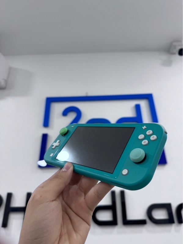 Máy chơi game Nintendo Switch Lite - chưa hack - Màu xanh - Ngoại hình 97% - Kèm 1 case, 1 sạc, 2 tay gắn phụ kiện