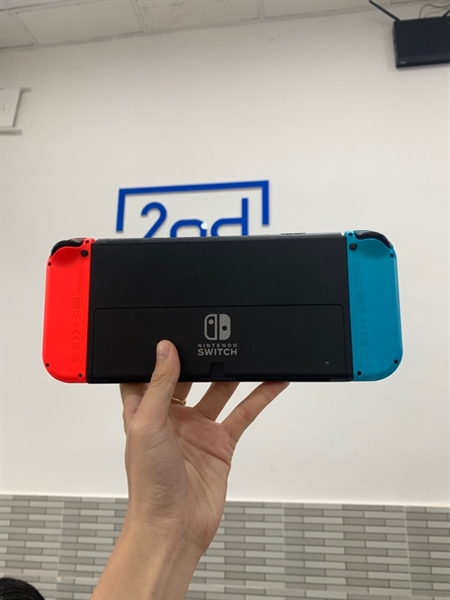 Máy chơi game Nintendo Switch Oled - Đã hack - Màu neon - Ngoại hình: 97% - Màn trầy - Body, kèm grip lớn + nhỏ - Kèm sạc 2