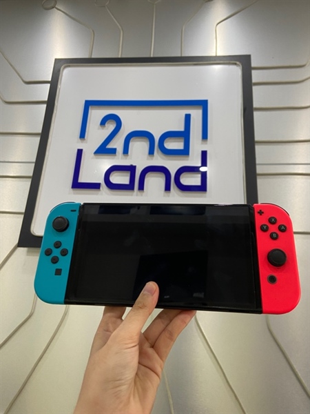 Máy chơi game Nintendo Switch Oled - Joycon màu Neon xanh đỏ - Ngoại hình: 97% - Màn trầy, lỗi cảm biến ánh sáng - Body - Kèm Dock xuất hình + Sạc + Thẻ nhớ 128GB + Grip + Hộp chống sốc 1