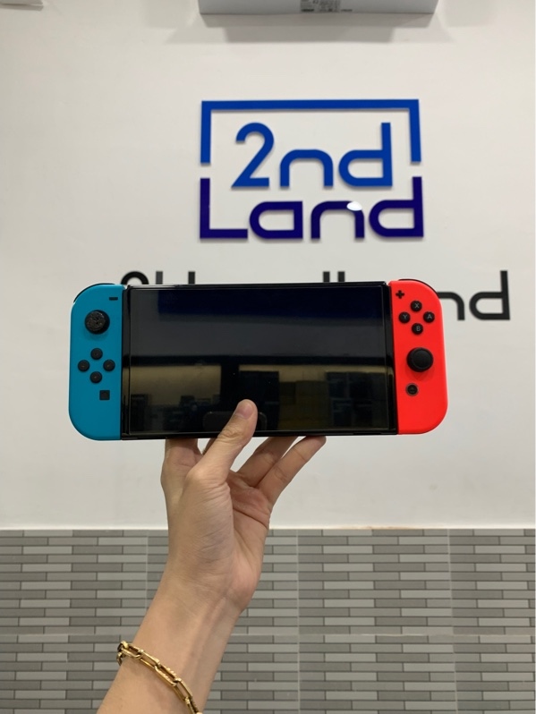 Máy chơi game Nitendo Switch Oled - Đã hack - Màu neon - Ngoại hình: 97% - Tróc joycon trái dính keo - Fullbox, kèm thẻ 256GB