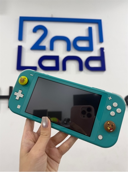 Máy game Nintendo Switch Lite - Chưa hack - Màu xanh - Ngoại hình 97% - Ố nút bấm , ám vàng nhẹ nửa bên phải - Kèm 1 sạc , 1 túi 2
