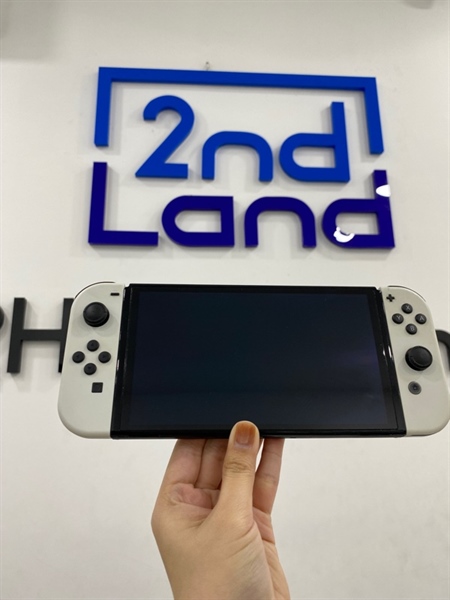 Máy game Nintendo Switch Oled - Đã hack HV Gaming - Màu trắng - Ngoại hình 97% - Joycons ố nhẹ , dock xuất hình hư - Kèm 1 hdmi , 1 sạc , 1 girp lớn , thẻ 128GB , 1 túi 1