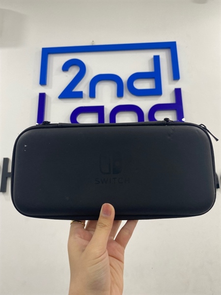 Máy game Nintendo Switch V2 - Đã hack - Màu đen - Ngoại hình 97% - còn host , màn ám vàng , máy trầy xước - Kèm túi, sạc , thẻ 64gb