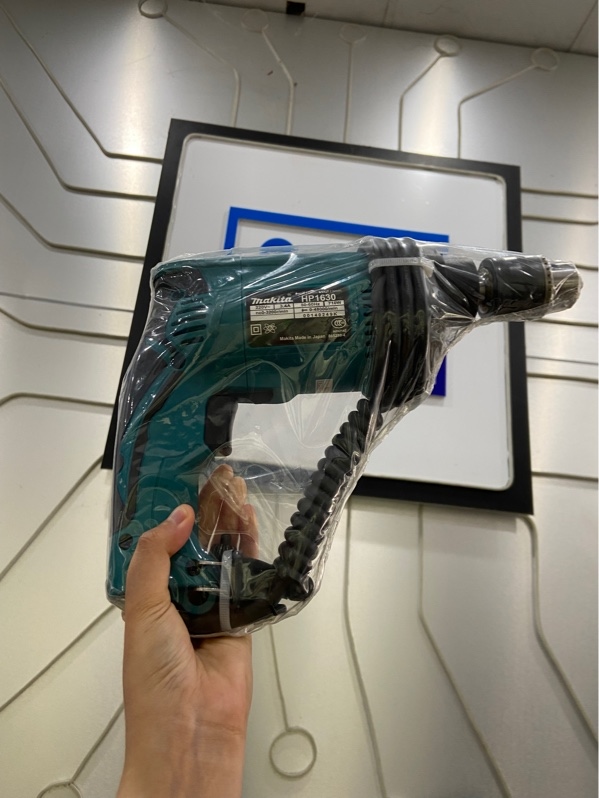 Máy khoan Makita HP1630 - Màu xanh - Newseal