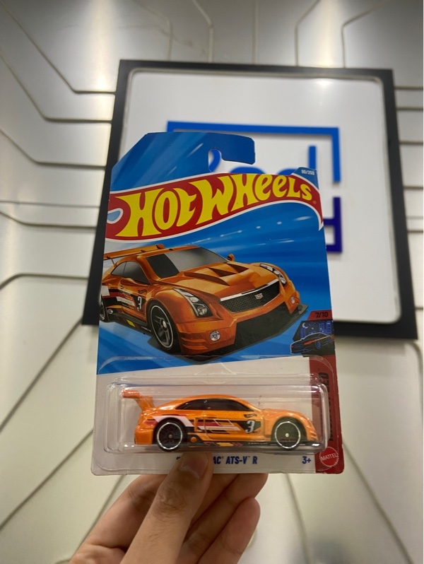 Mô Hình Hot Wheels 16 Cadillac - Màu cam - Newseal
