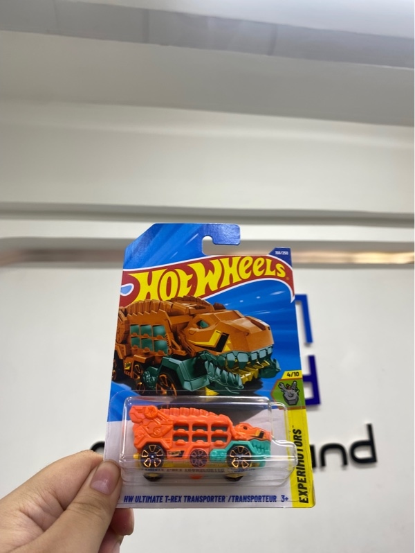 Mô hình xe Hotwheels HW Ultimate T-REX Transporter /Transporteur - Màu cam - Newseal