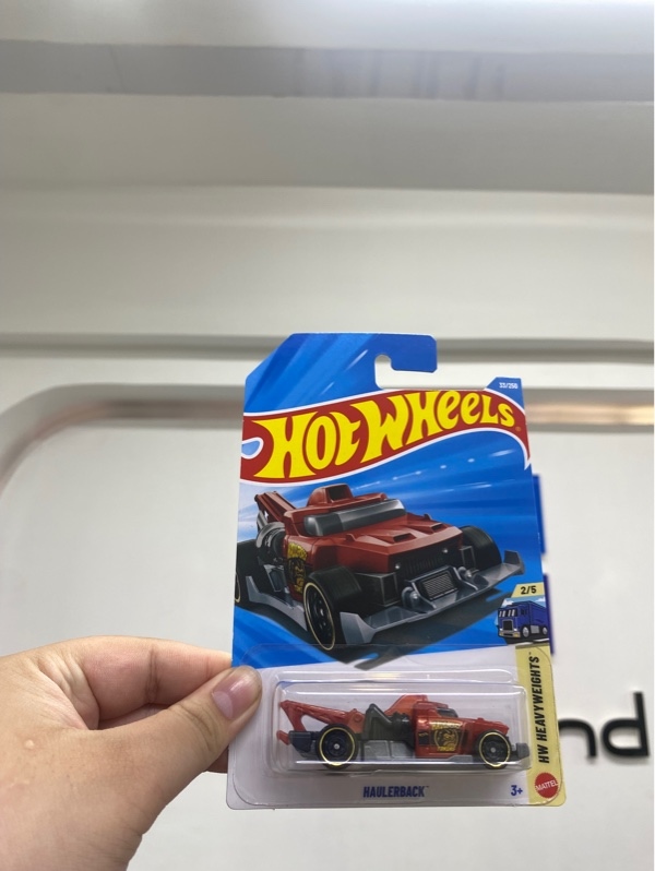 Xe mô hình Hot Wheels Haulerback - Màu đỏ đậm - Newseal
