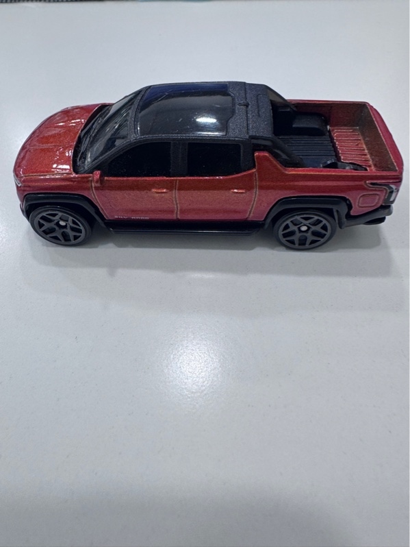 Xe mô hình Hot wheels Silverado EV RTS - Màu cam - Ngoại hình 98%, kính trầy nhẹ - Body