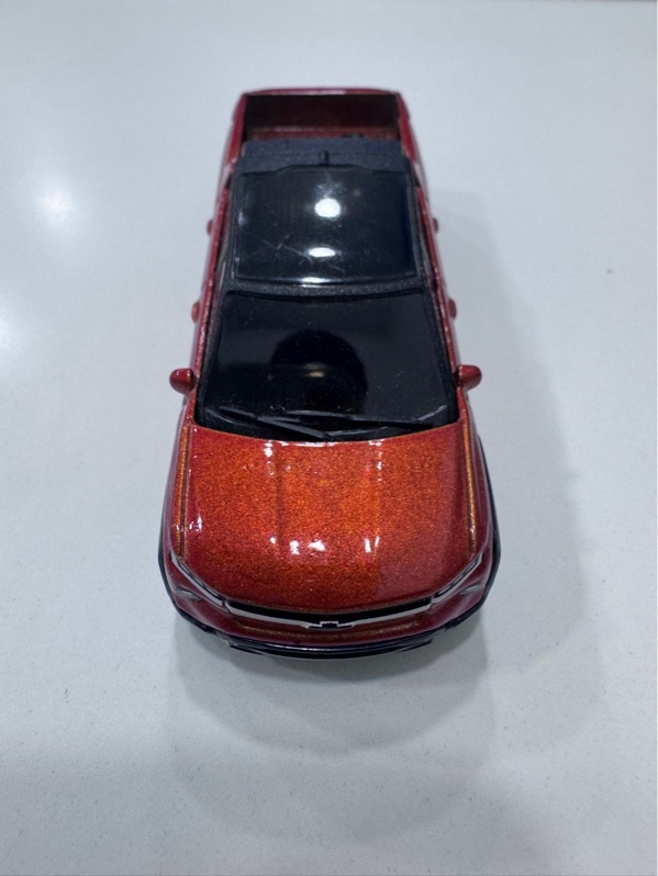 Xe mô hình Hot wheels Silverado EV RTS - Màu cam - Ngoại hình 98%, kính trầy nhẹ - Body
